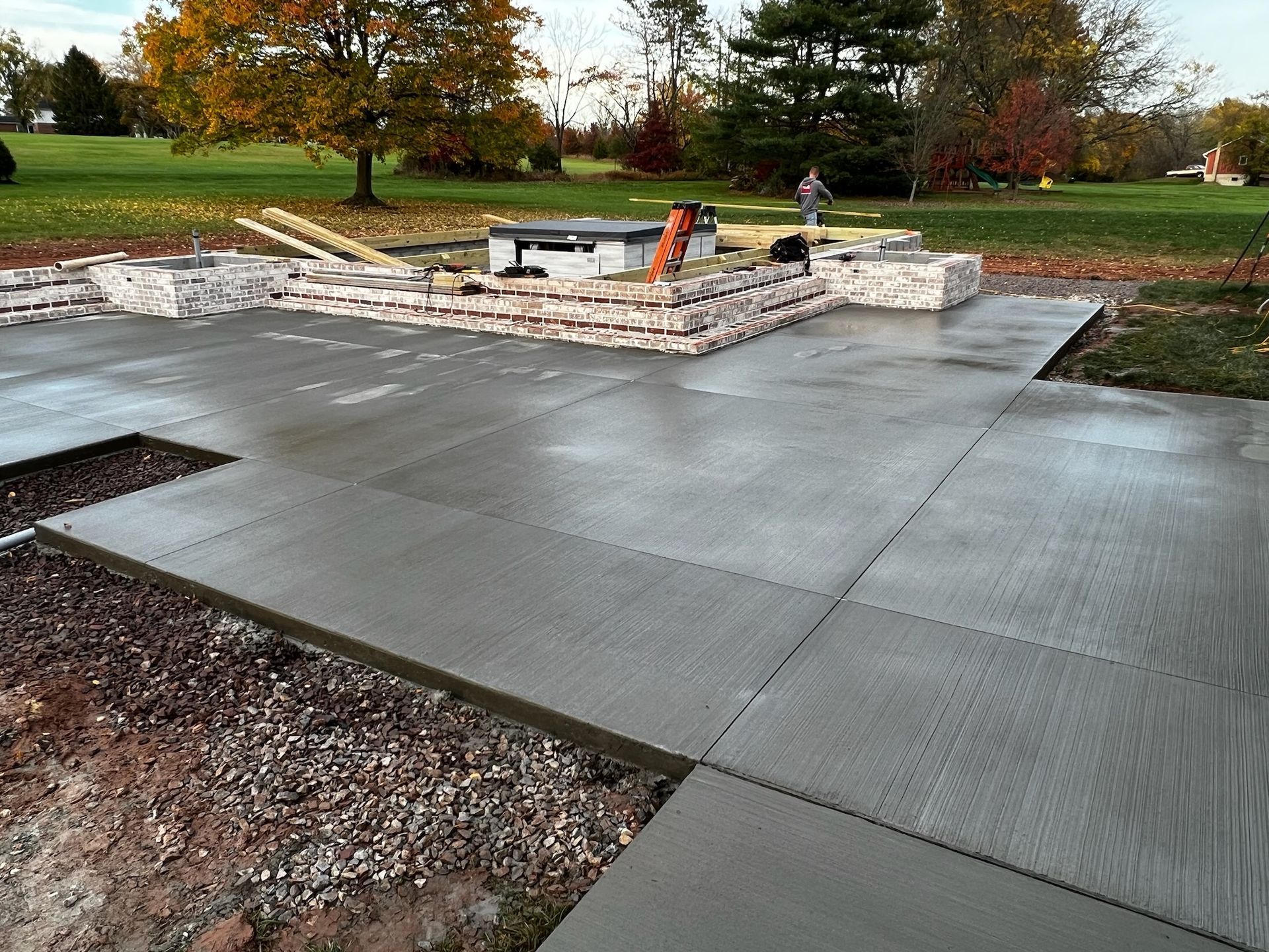 a concrete patio is being built