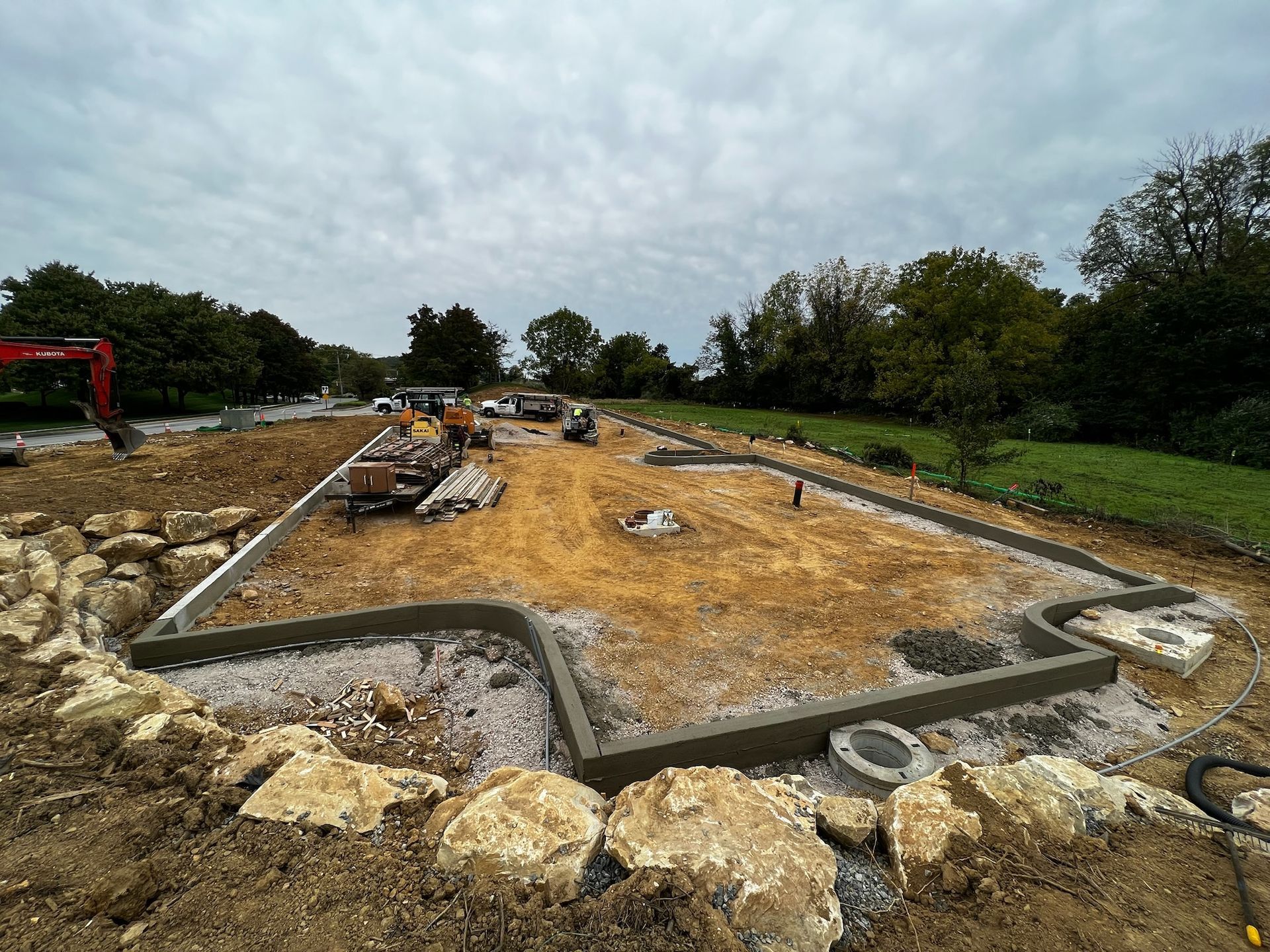 a construction site with a lot of dirt and rocks
