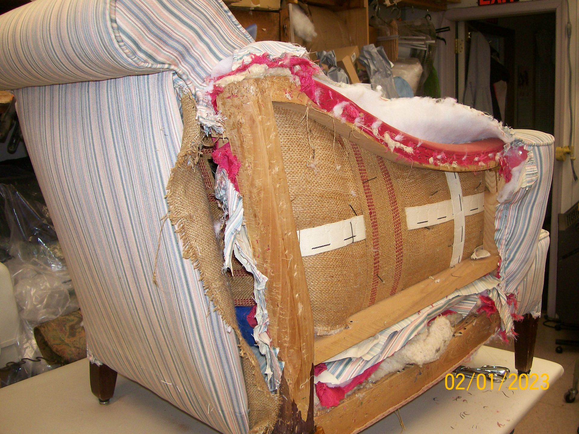 A picture of a chair being repaired shows the back of the chair