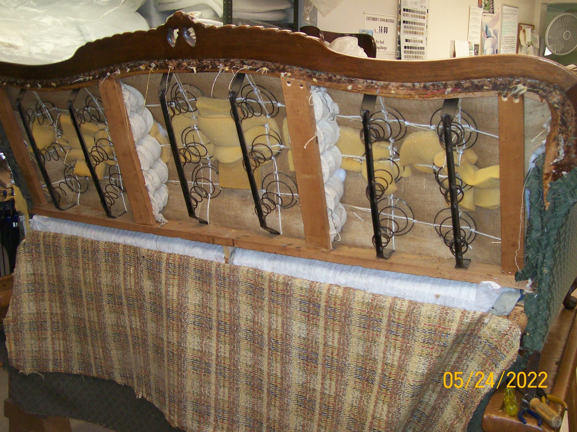 A picture of a couch restoration