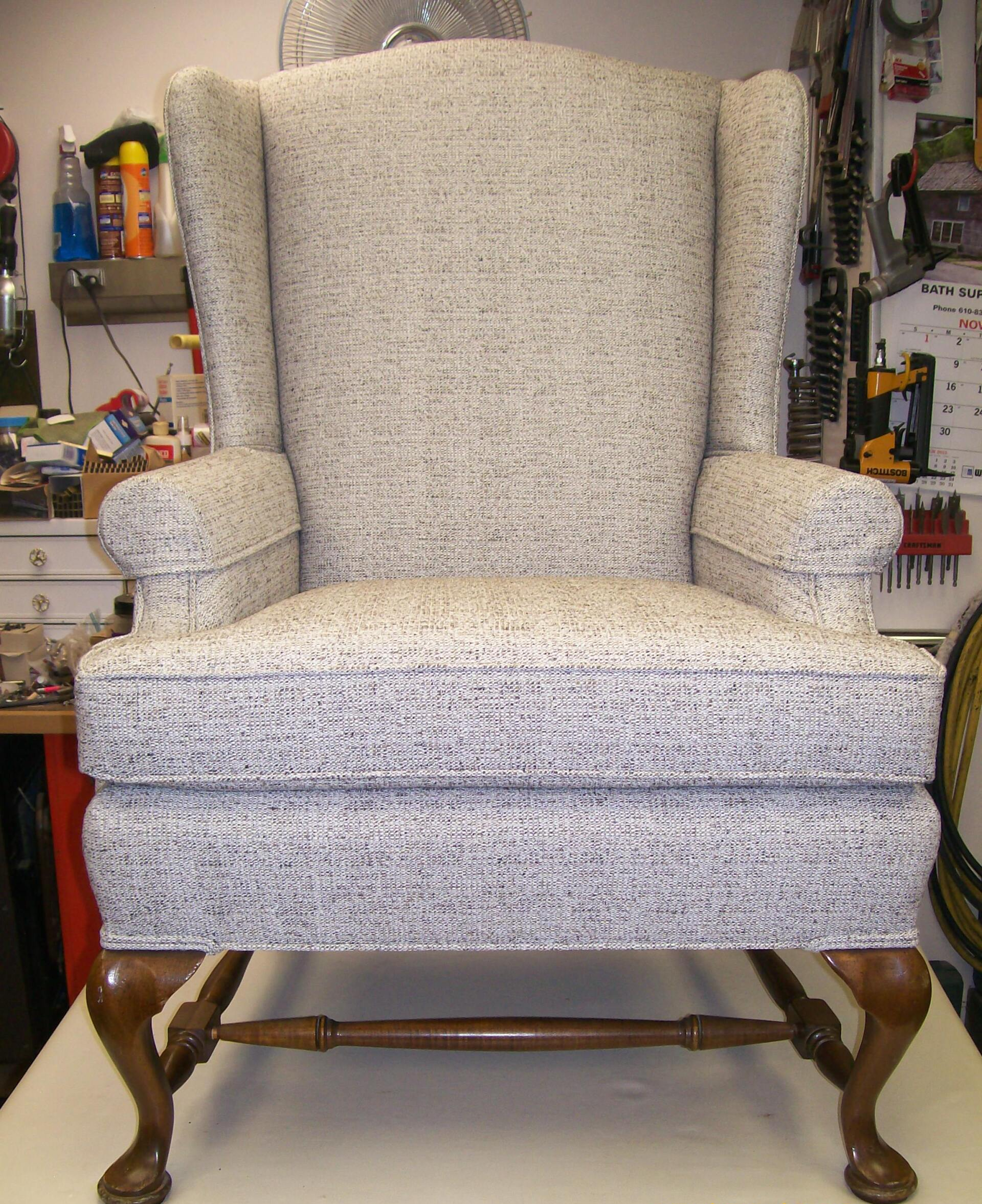 A chair is sitting on a white table in a room