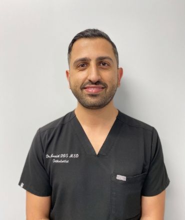 Dentist Dr. Matthew Moadel, smiling man