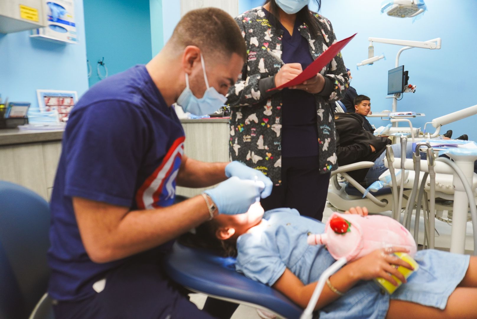 Dentist working on a small child