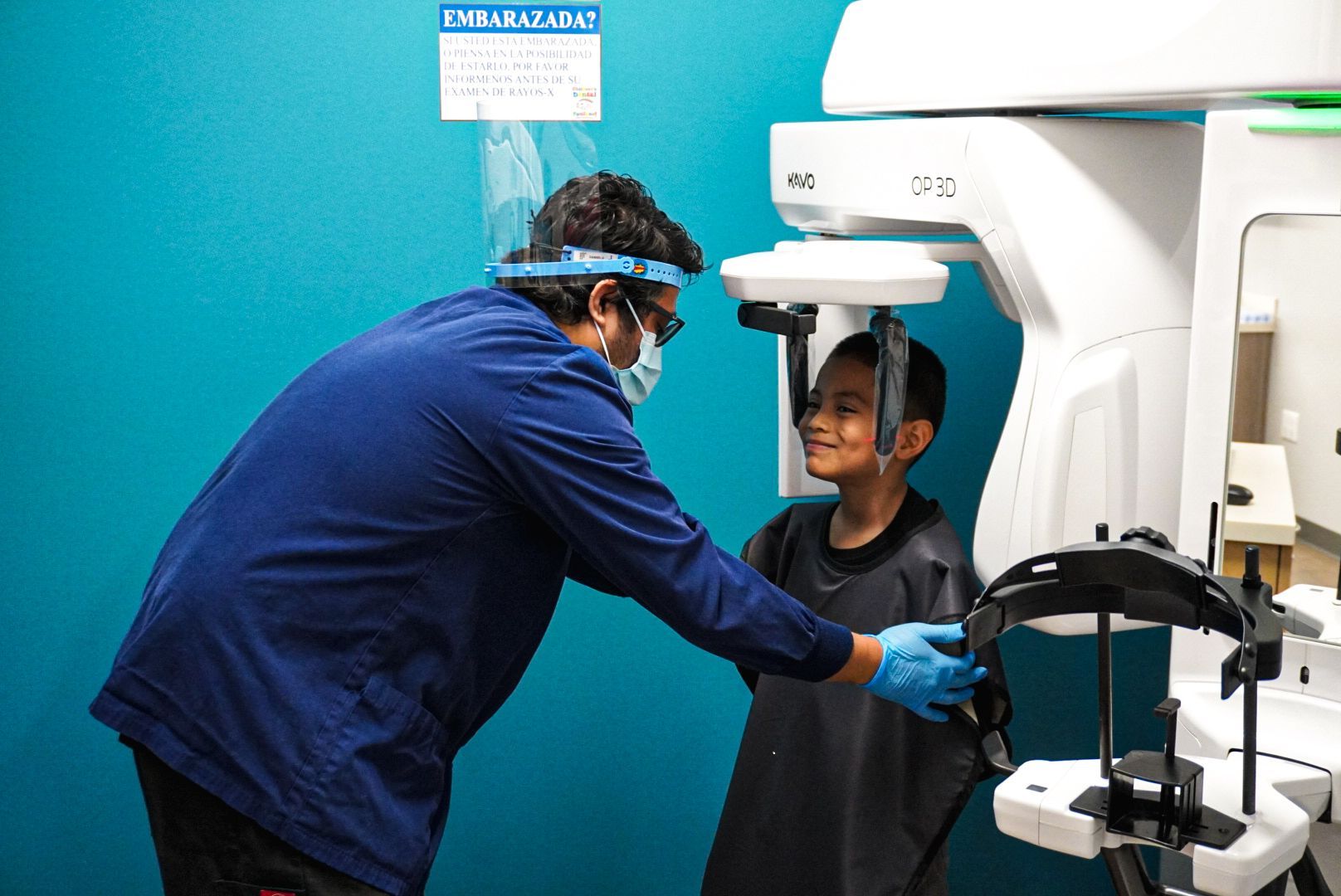 smiling child during xray at dental office