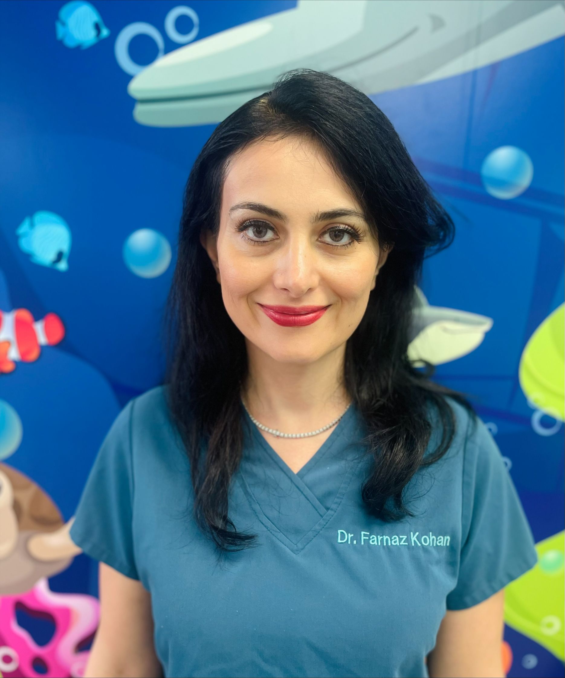 Smiling woman, Dr Johan