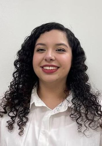 Dark haired woman smiling