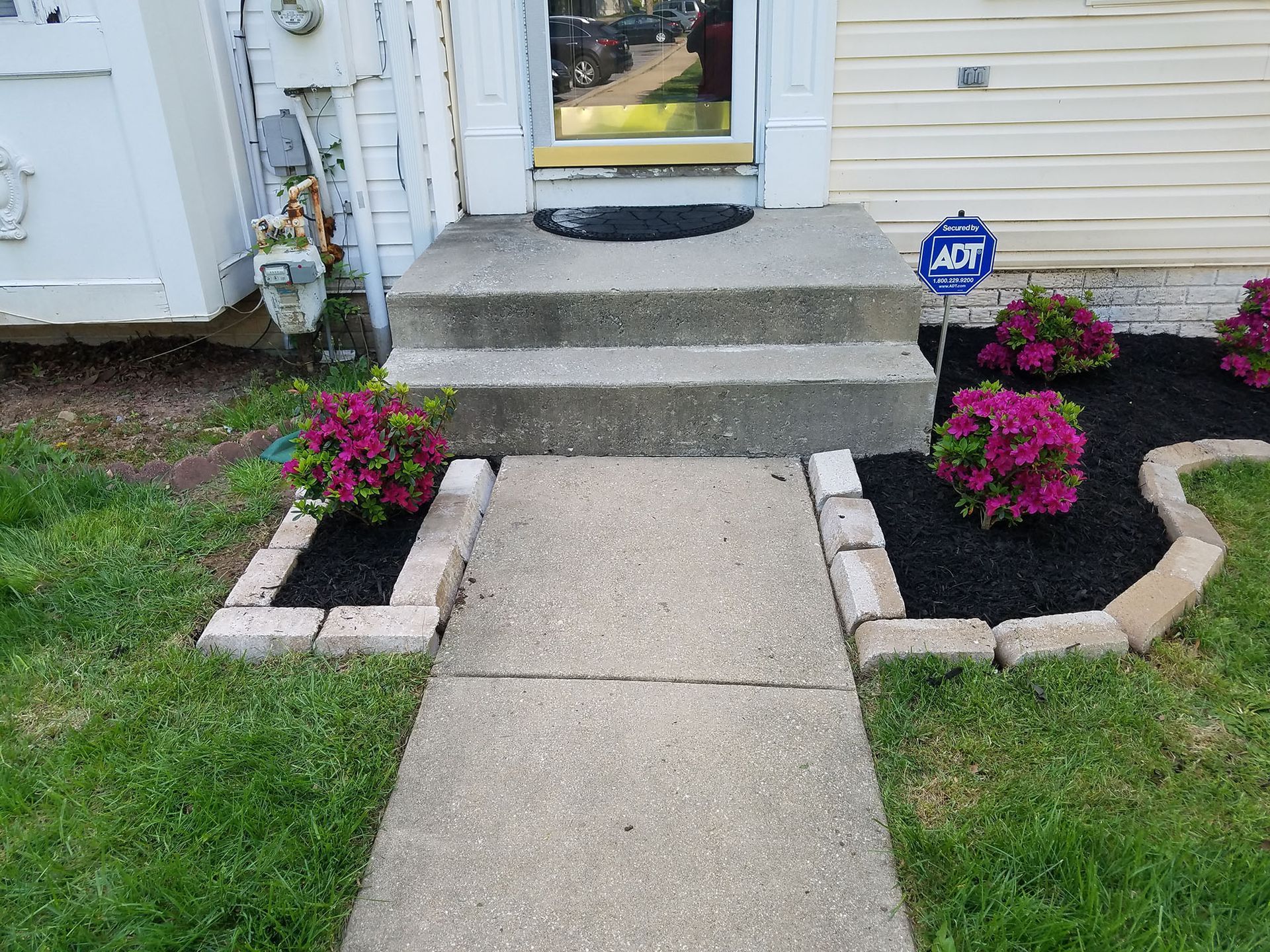 Flower décor on the side of a house