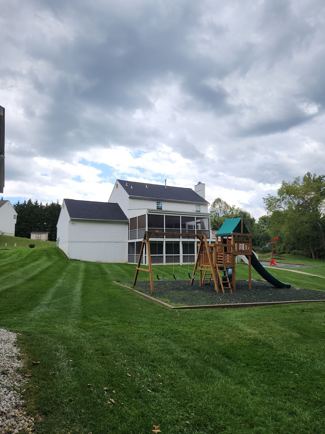 Beautiful lawn with a playground in the middle