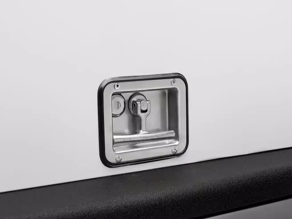 Square metal flush mount on a white wall above a black surface