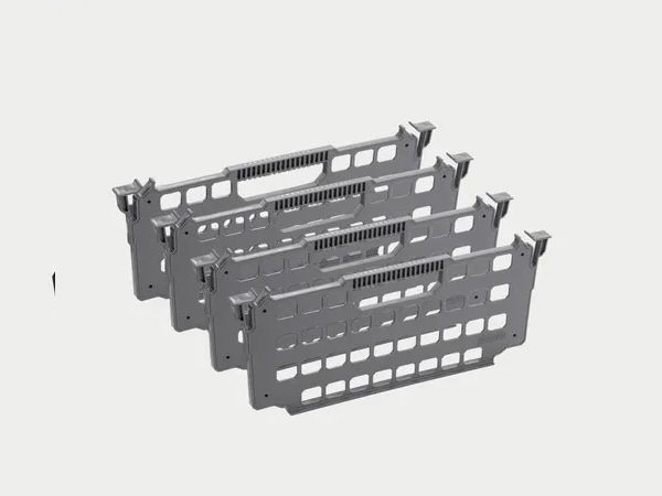 Stacked gray metal mesh panels with mounting brackets