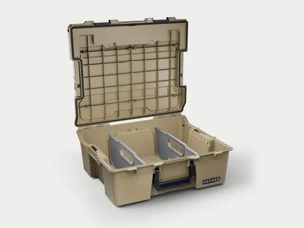 Tan open beige hard case with lid, grid panel, and two gray dividers inside.