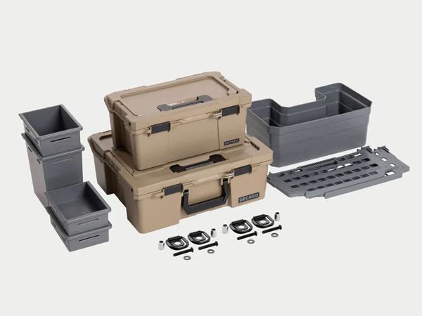 Beige and gray modular storage bins, stacked cases, and mounting hardware on a white background