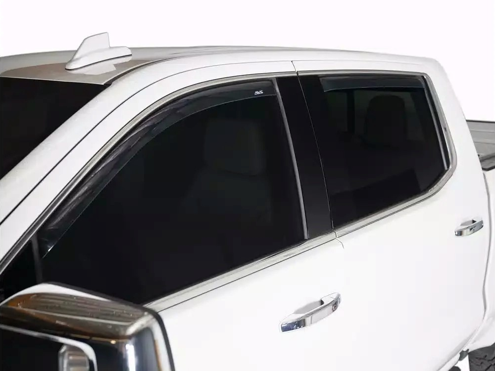 White SUV with dark tinted side windows and chrome trim