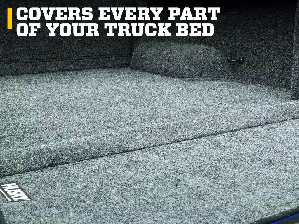 Gray truck bed liner covering the entire truck bed, with text COVERS EVERY PART OF YOUR TRUCK BED
