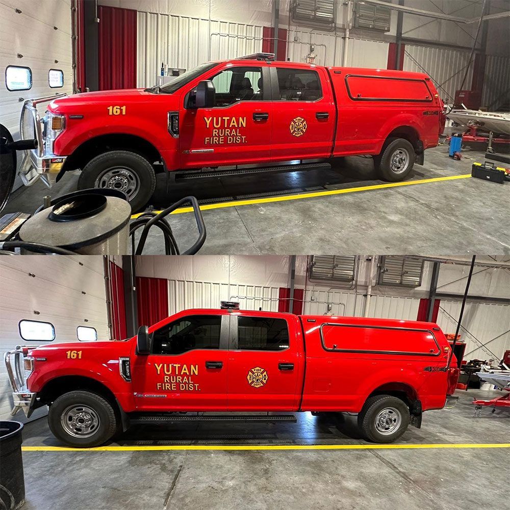 A red truck with the word yutan on the side