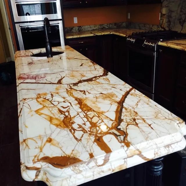 White marble kitchen countertop with brown veining.