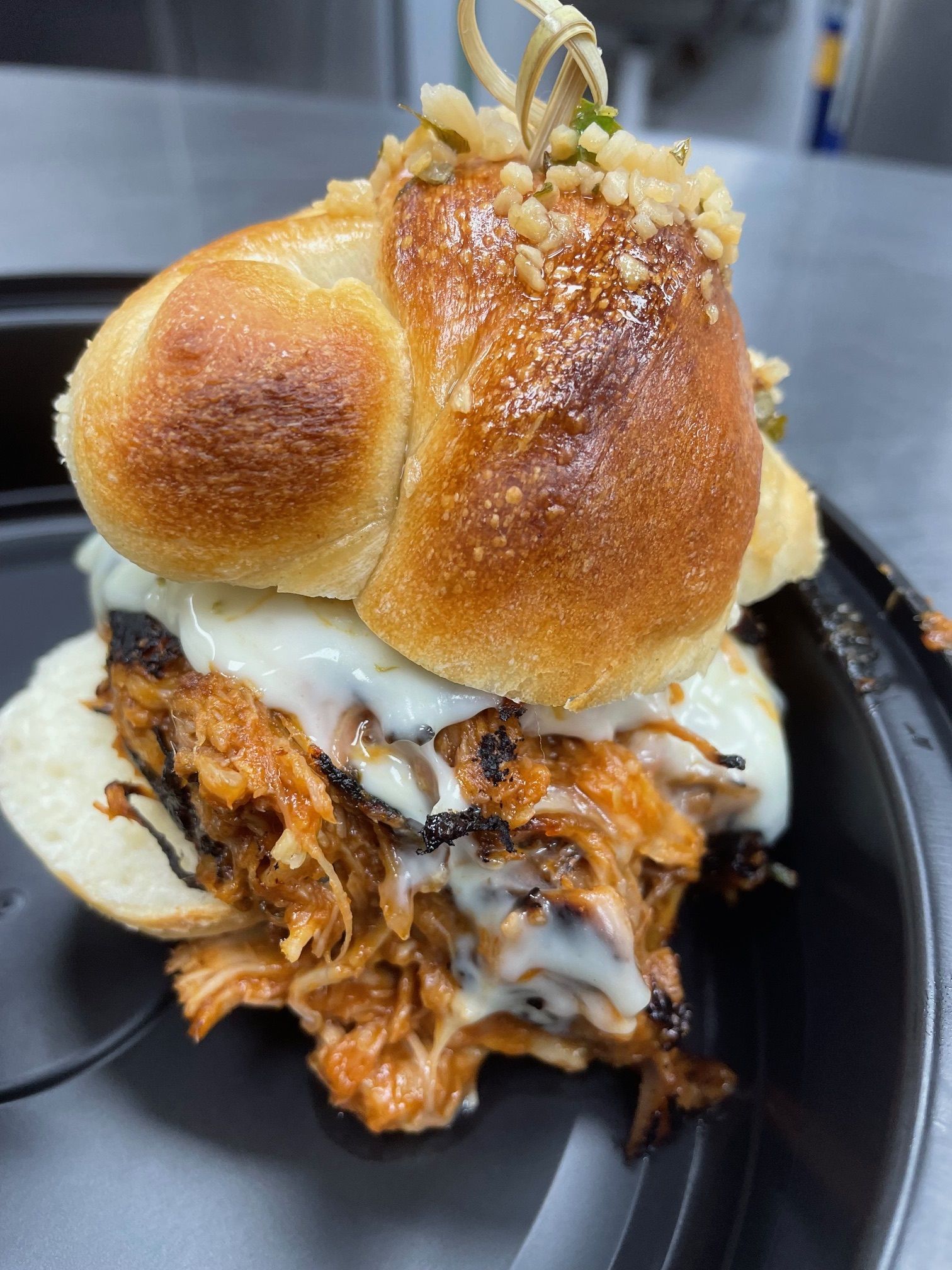 A close up of a sandwich on a plate on a table.