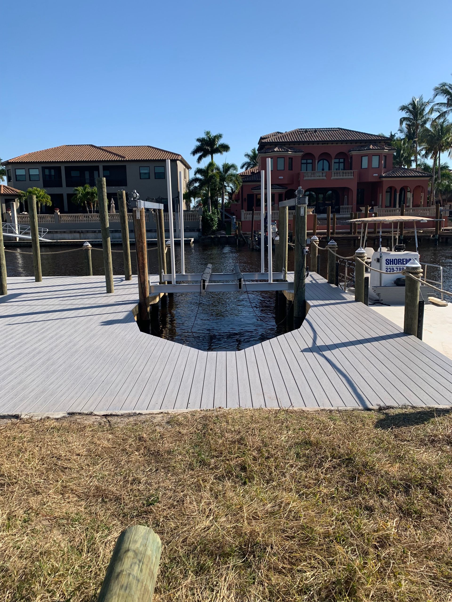 A dock with a hole in the middle of it