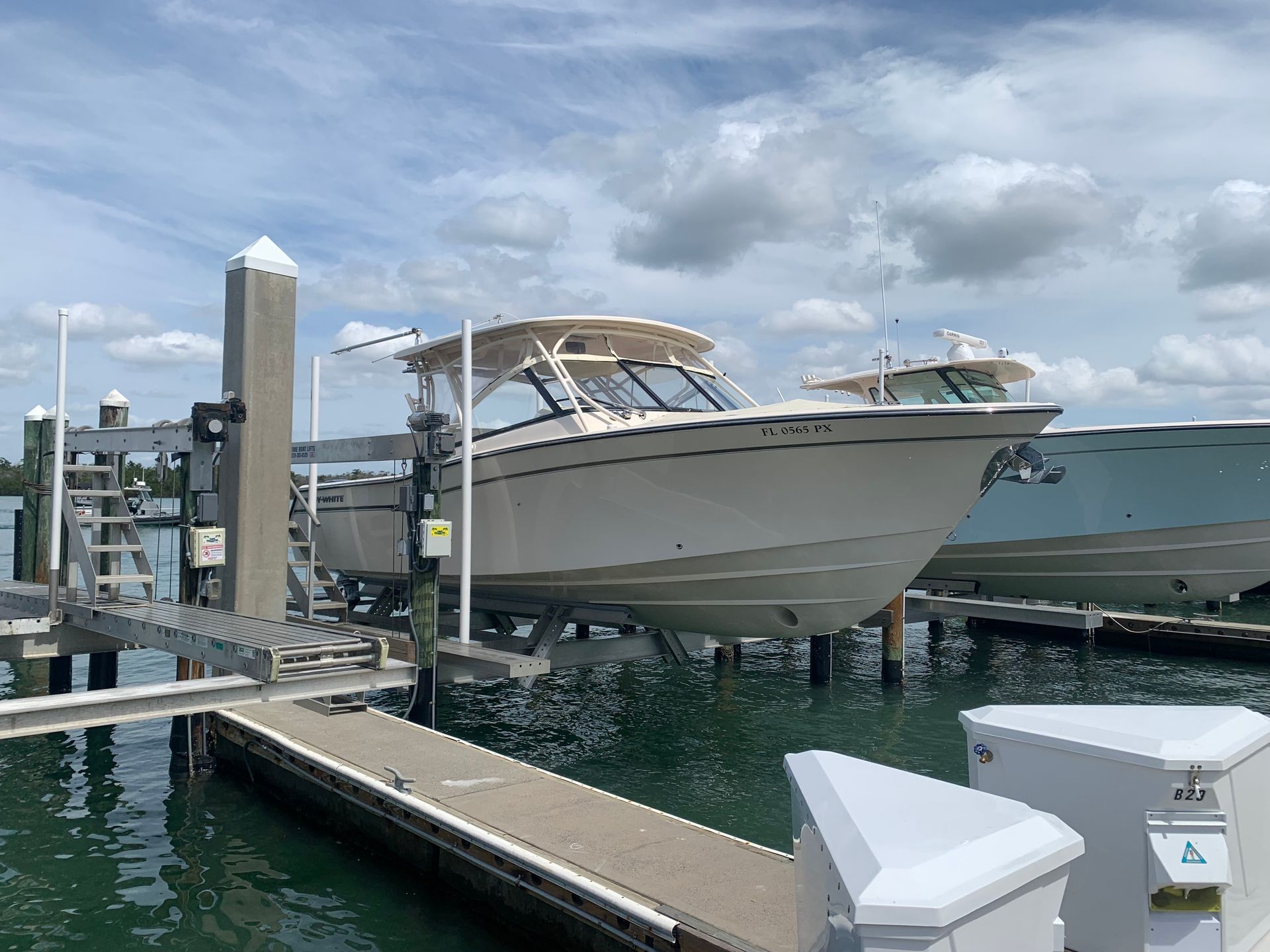 A boat is docked at a dock in the water.