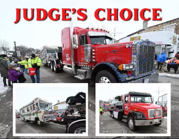 A red semi-truck in a parade, 