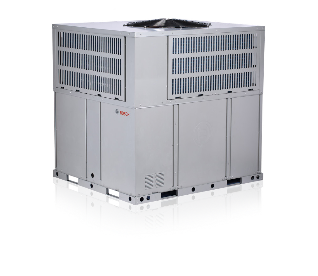 A large air conditioner is sitting on top of a white surface