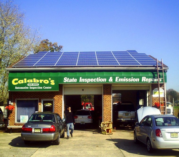 Calabre 's state inspection and emission repairs has solar panels on the roof.
