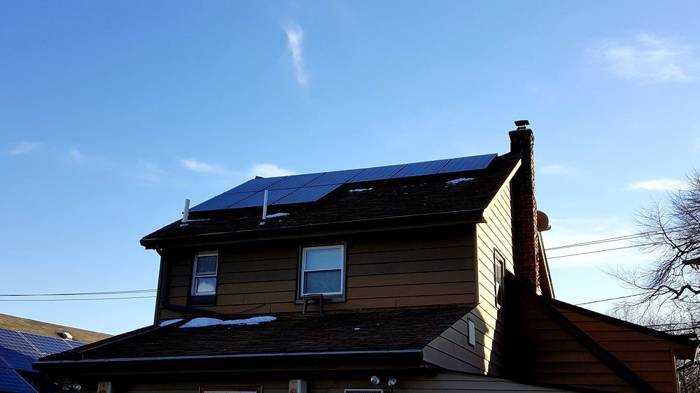 A house with solar panels on the roof.
