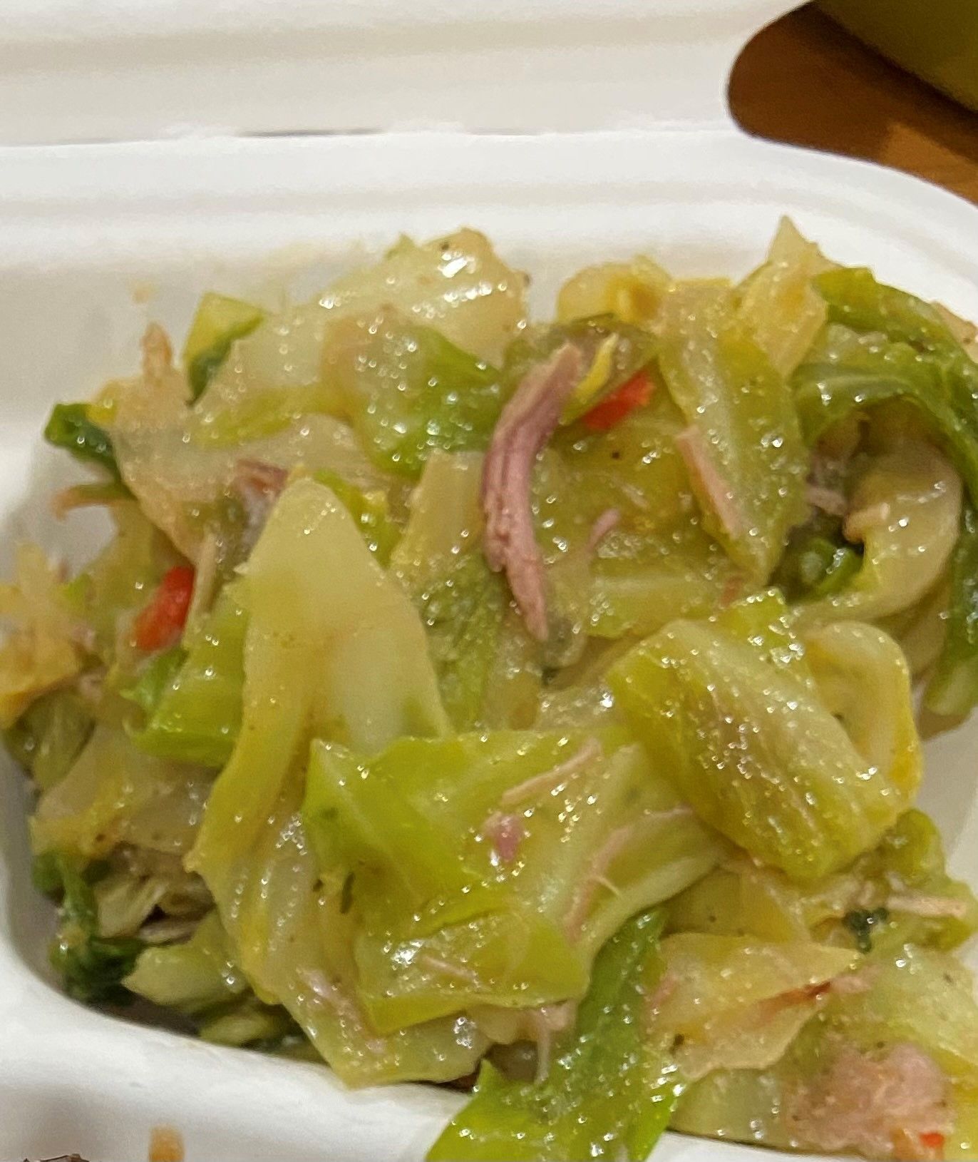 A close-up of a bowl of cabbages on a table