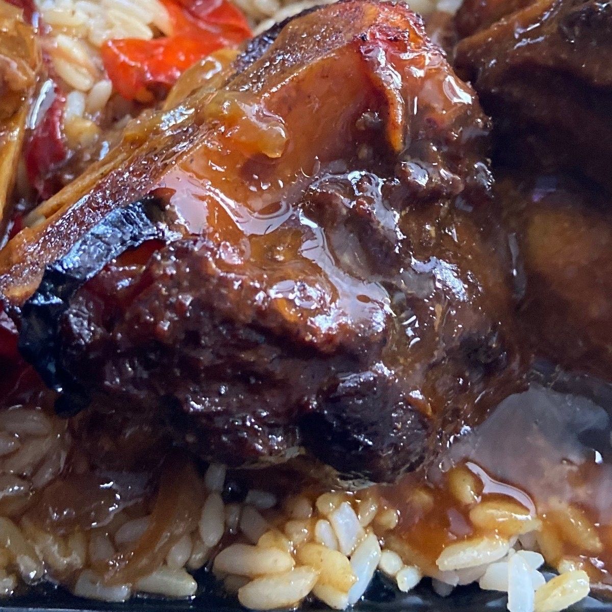 A close-up of a plate of oxtails