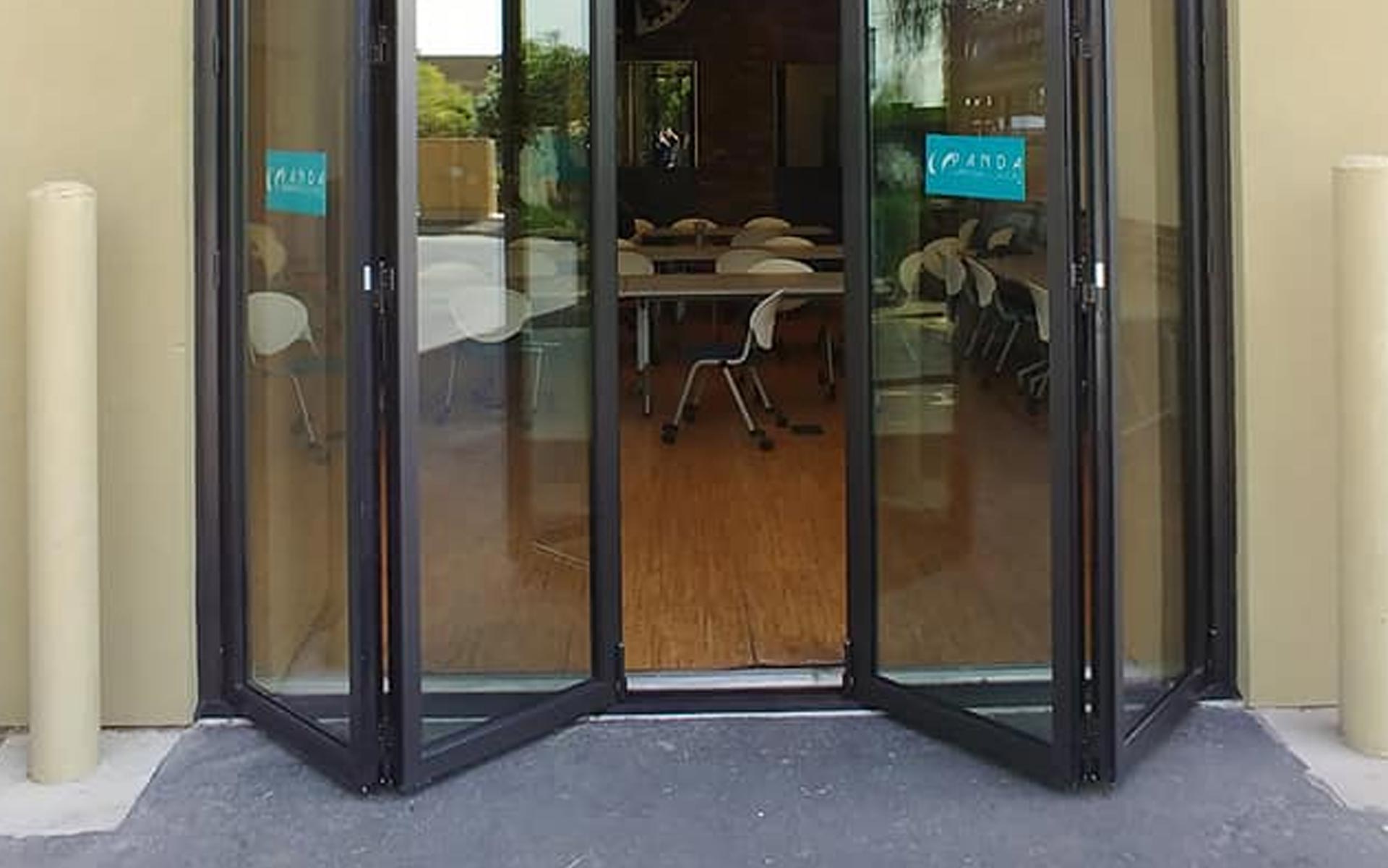 Folding glass doors
