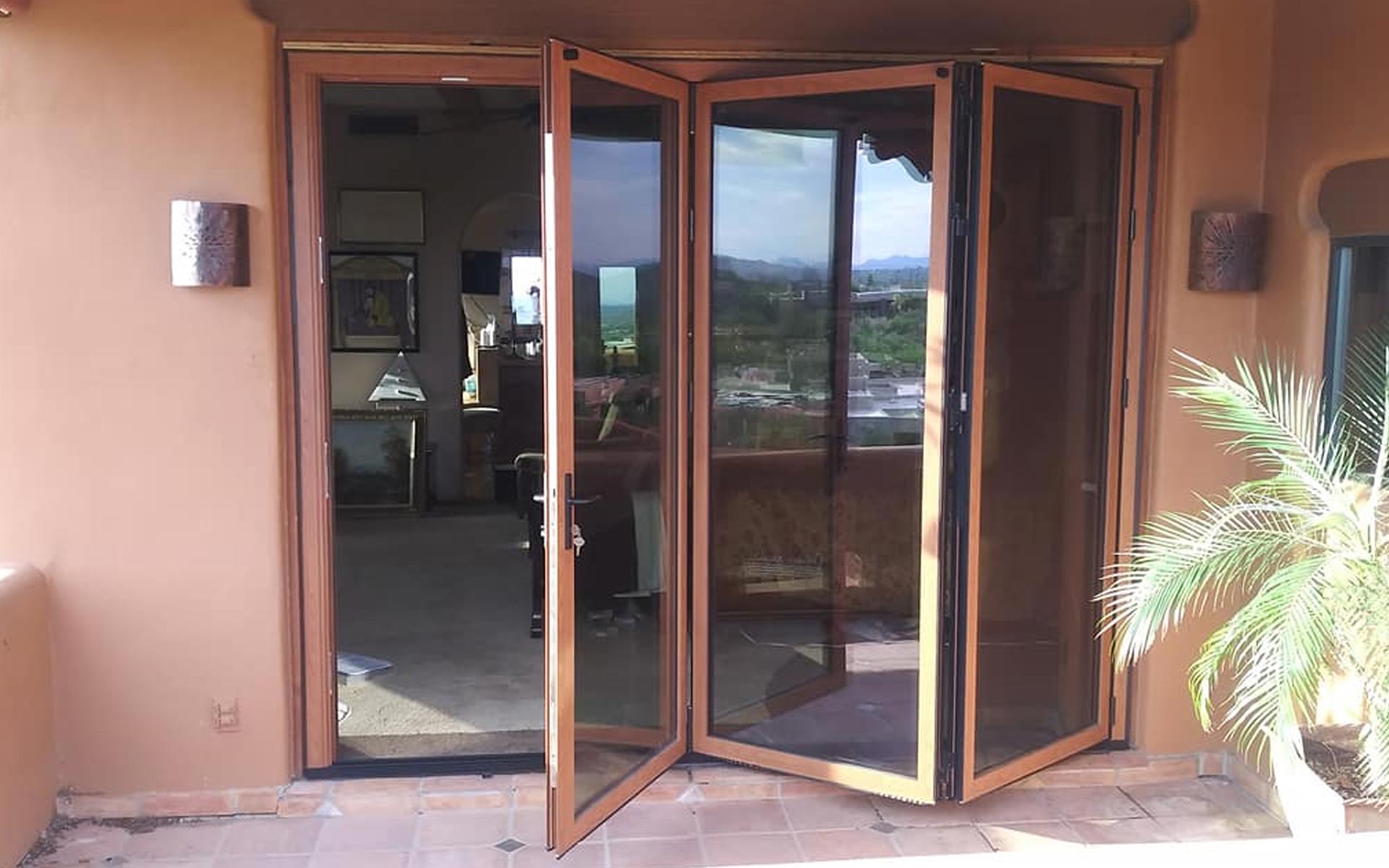 Folding glass doors