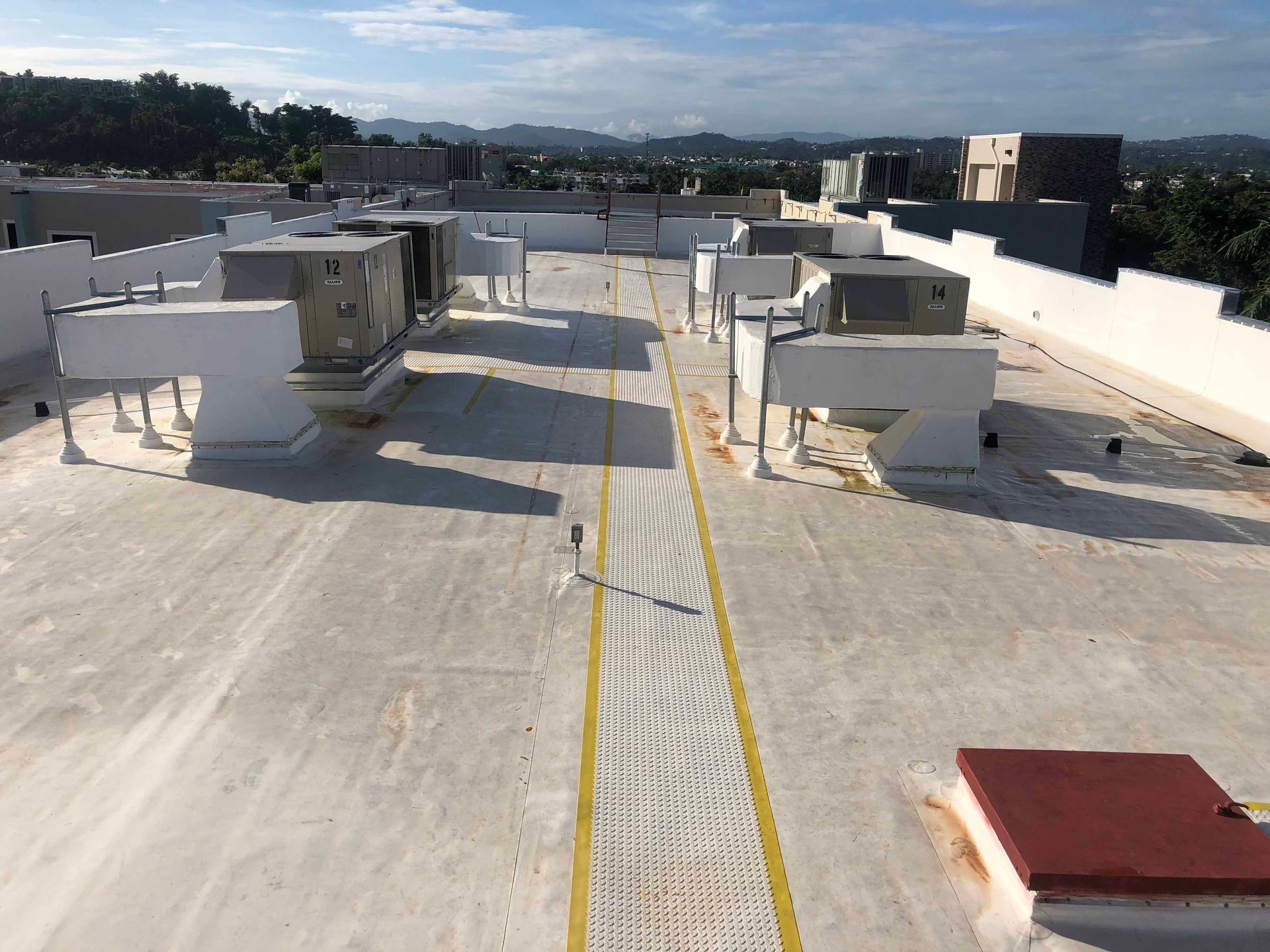 The roof of a building with a lot of boxes on it