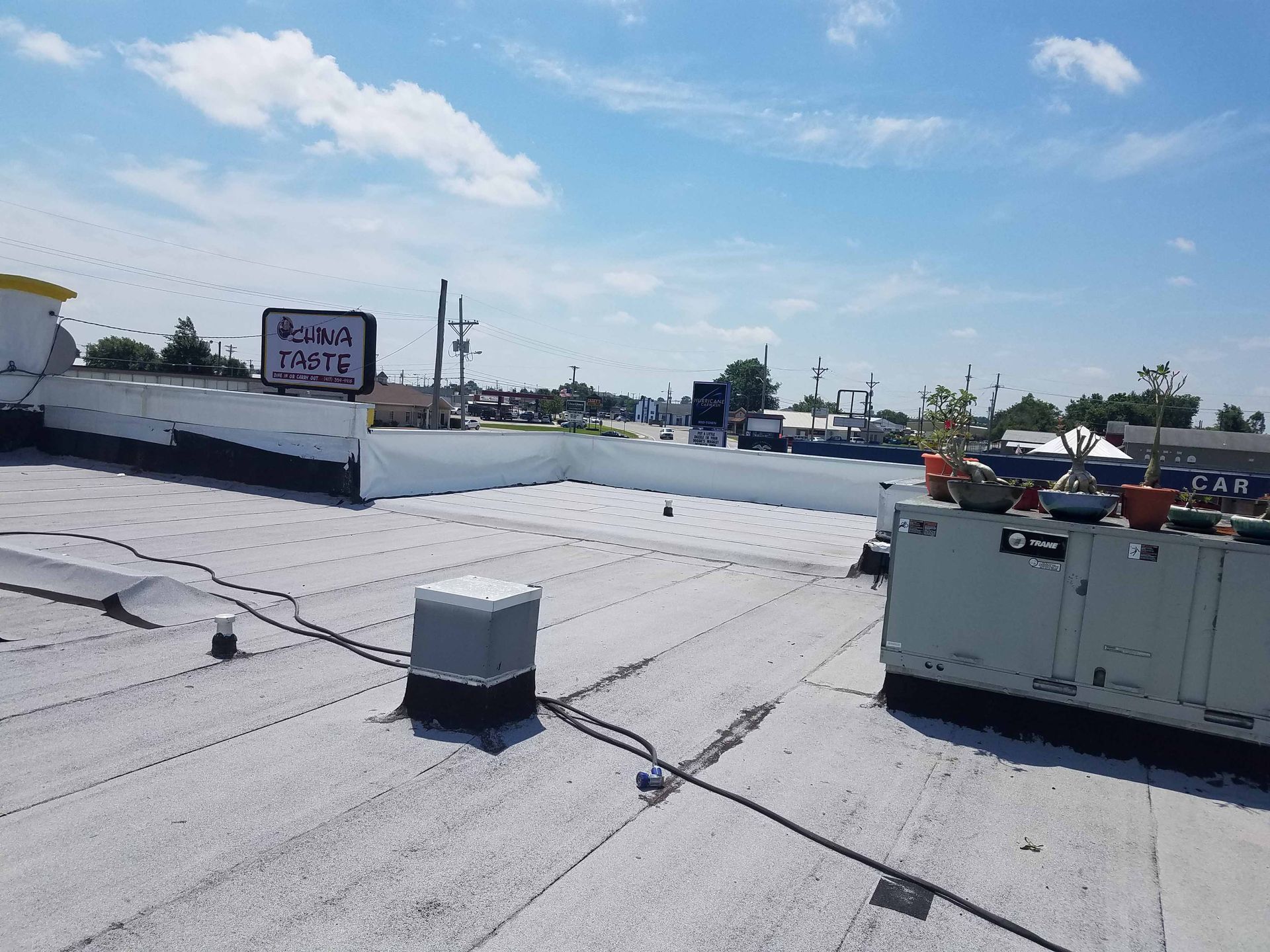 A rooftop with a sign that says ' a ' on it