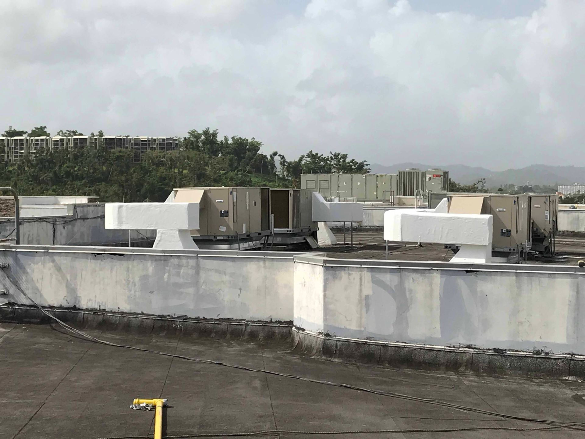 The roof of a building with a lot of boxes on it.