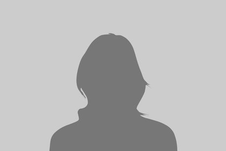 A silhouette of a woman 's head on a gray background.