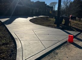 a concrete driveway is being built