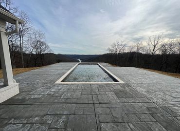 fiberglass swimming pool in the middle of a patio