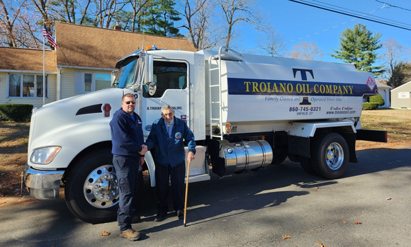 ernest maynard in front of troiano oil truck