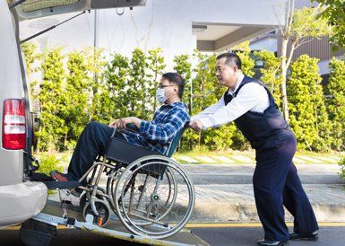 Boarding handicapped person in transportation vehicle