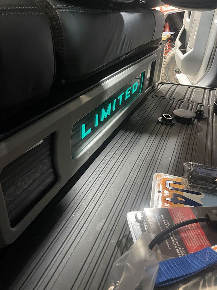 The word limited is on the side of a car