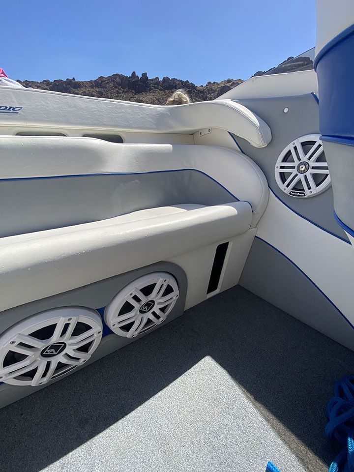 A boat with speakers on the side of it