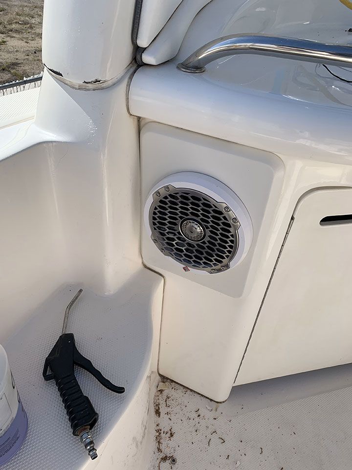 There is a speaker on the side of a boat
