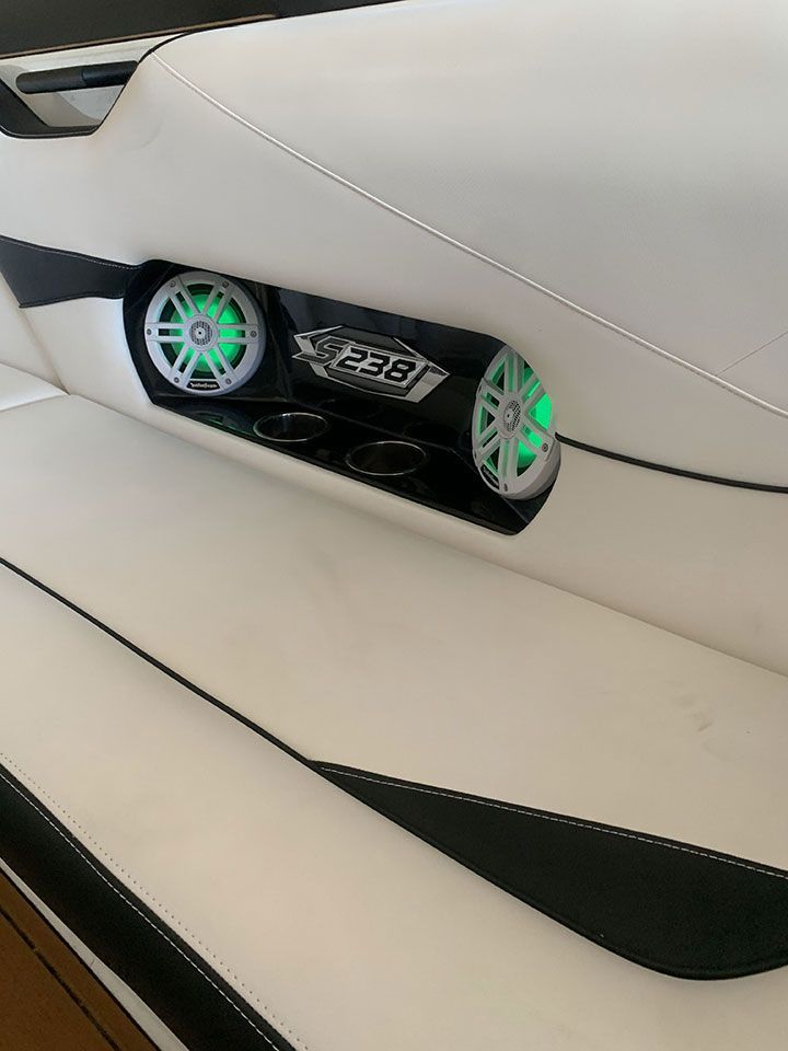 There are two speakers on the side of a boat