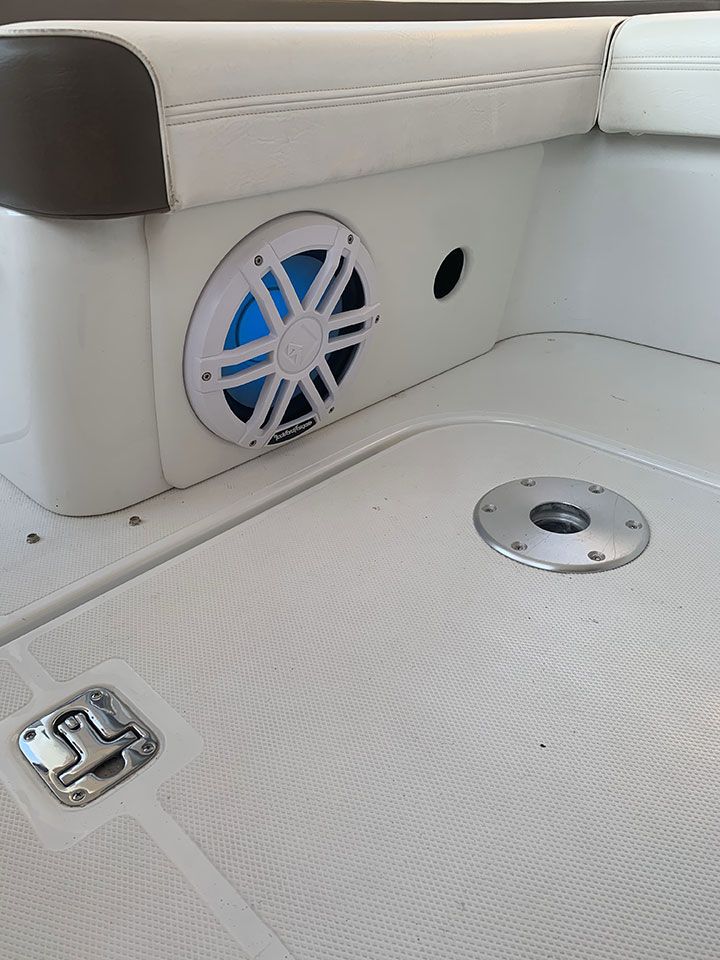A boat with a speaker on the side of it