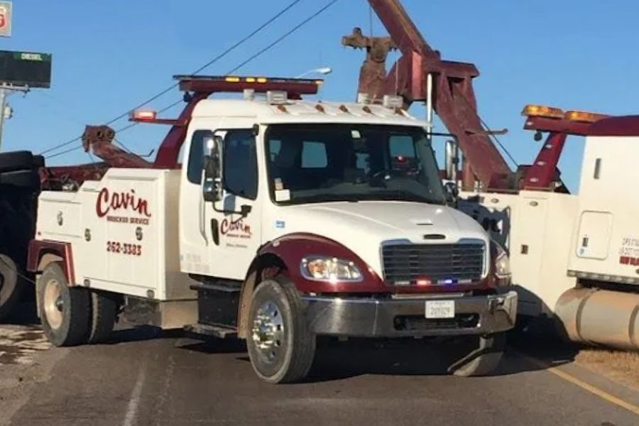 A white and red tow truck