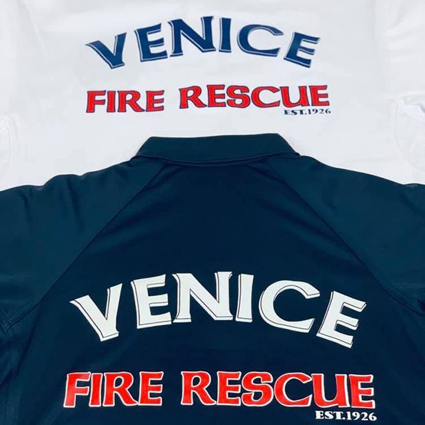 Navy shirt with white and red Venice Fire Rescue logo on white background