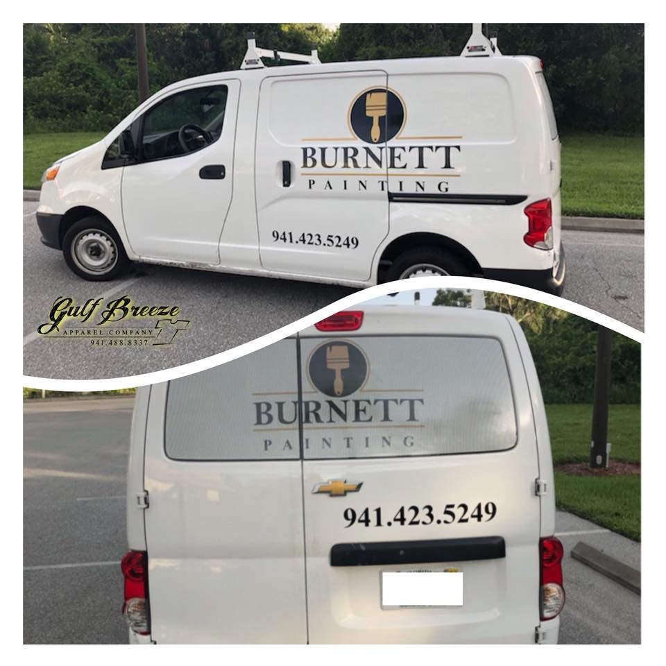 White Burnett Painting van with company logo and phone number parked outdoors.