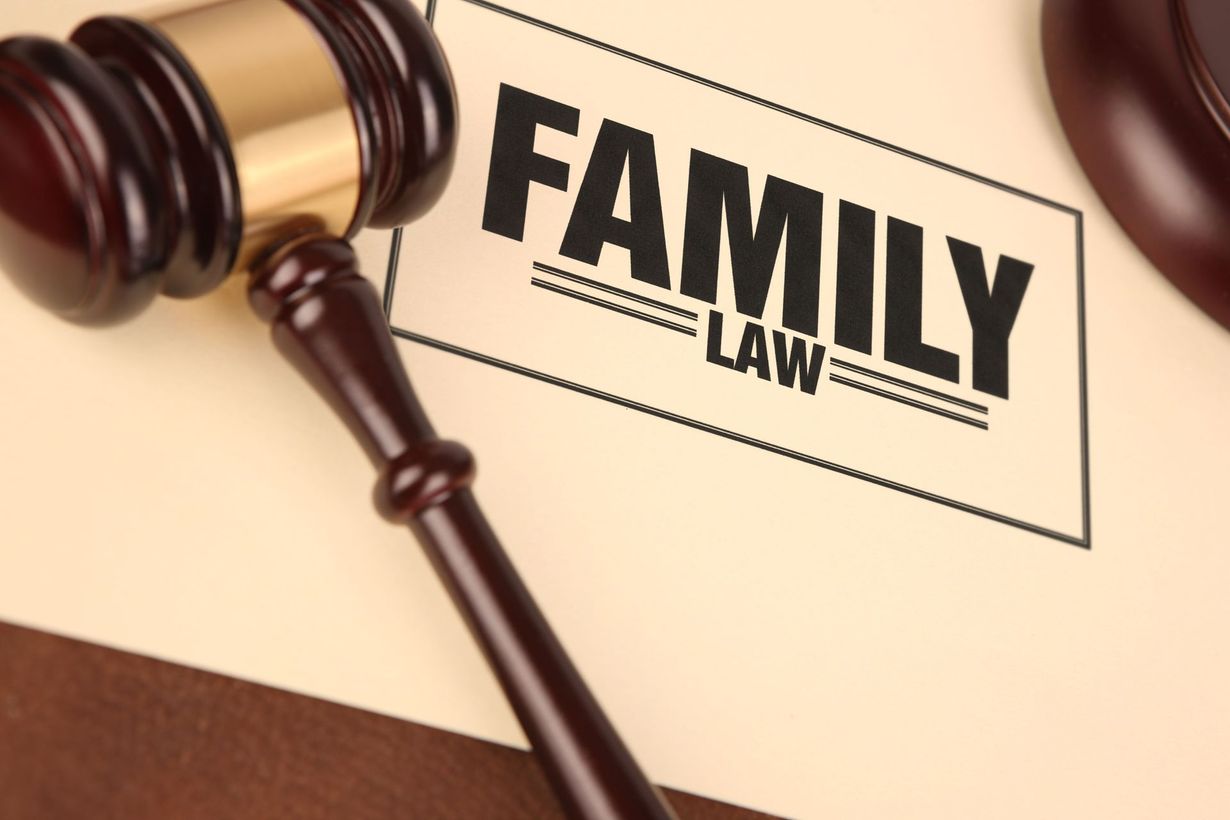 Judge’s gavel beside “FAMILY LAW” text on a legal document.