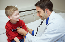 Doctor treating a kid