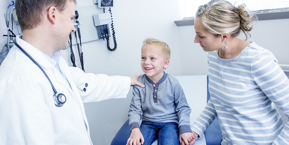 Doctor treating a kid